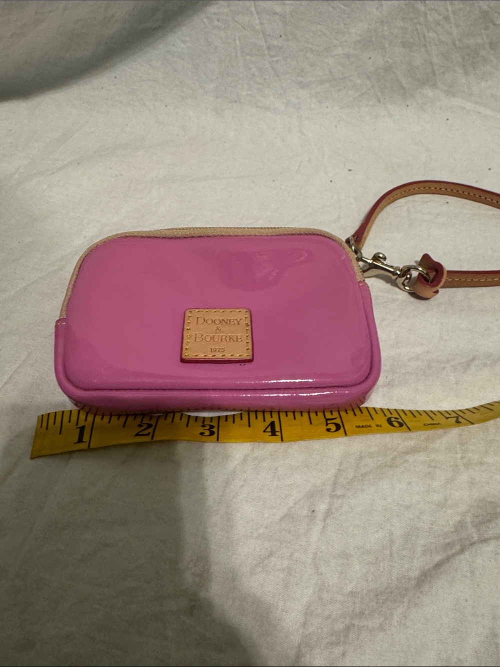 Dooney & Bourke Hot Pink Patent Wristlet with Tan Strap